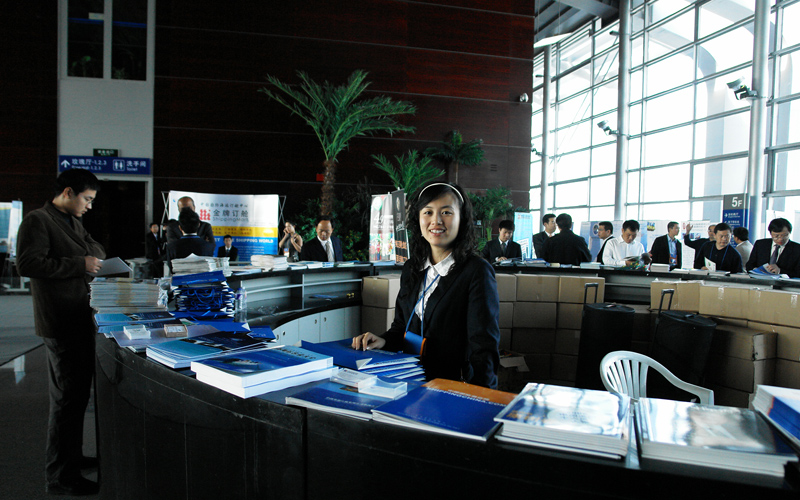 Conference materials desk in exhibition hall
